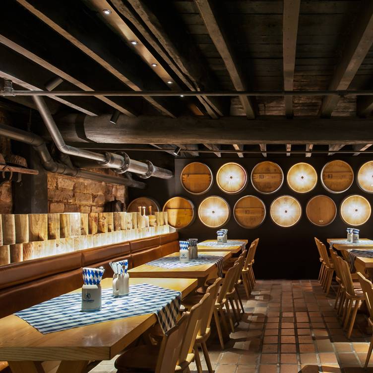 Long timber tables inside Munich Brauhaus The Rocks beer hall