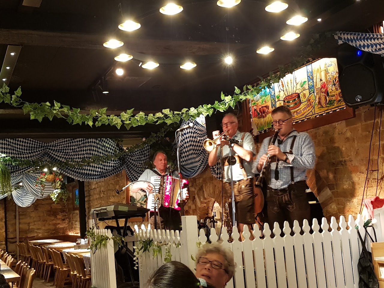 Live band performing inside Munich Brauhaus The Rocks